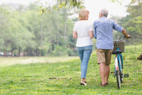 Older Couple walking in Park